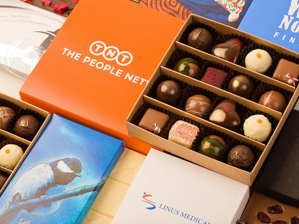 Käsitöösokolaadi kommikarbid ettevõtte logoga